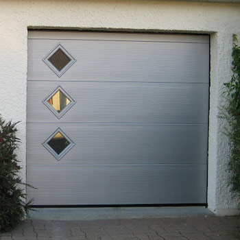 Faire poser une porte de garage par une entreprise à Limay ou à Mantes-la-Jolie.